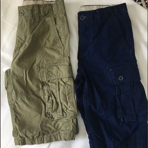 Two used pairs of boys Gap cargo shorts.